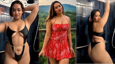 Divya Mistry teases in a wet black bikini, showing off her perfect tits